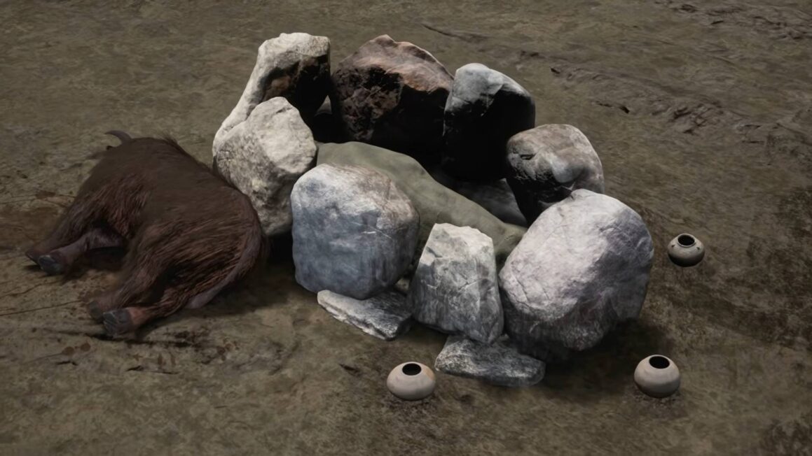 Rekonstrukcja kamiennej obstawy pochówku kultury amfor kulistych w Kaliszanach: ciało zmarłego otoczone jest dużymi głazami, obok leżą naczynia ceramiczne i szczątki zwierzęcia.