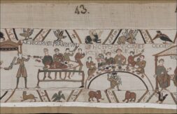 Uczta przedstawiona na Tkaninie z Bayeux. Biskup Odo błogosławi jedzenie i napoje podczas posiłku poprzedzającego bitwę pod Hastings w 1066 rok