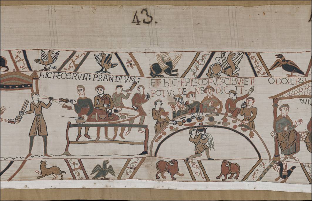 Uczta przedstawiona na Tkaninie z Bayeux. Biskup Odo błogosławi jedzenie i napoje podczas posiłku poprzedzającego bitwę pod Hastings w 1066 rok